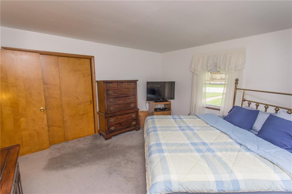 70 Darlington Road Patterson Heights, PA 15010 - Photo 12 of 20 Master Bedroom showcasing the large closet with original wood doors. Take a peak at the hardwood flooring under the closet door. Options!!!!!