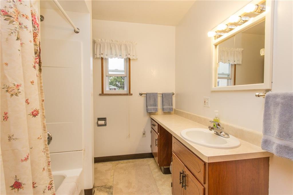 70 Darlington Road Patterson Heights, PA 15010 - Photo 13 of 20 Comfortable full bath features newer flooring, full shower, privacy window and 5' 6" vanity. Pristine condition!