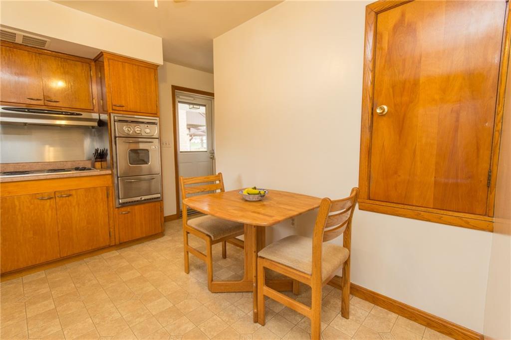 70 Darlington Road Patterson Heights, PA 15010 - Photo 7 of 20 Room enough for a breakfast table. Or be creative and add base cabinets and a countertop for additional work space. The pantry at right offers additional storage. The side door in background makes for convenience in grilling outdoors!