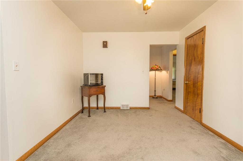 70 Darlington Road Patterson Heights, PA 15010 - Photo 10 of 20 Dining Room-Angle Two-shows the closet for extra storage and the flow from living room into dining. Wood doors and trim are in excellent condition!
