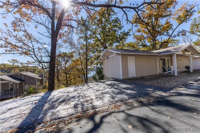 $300,000 | 24 Buoyant Place, Osage Beach, MO 65065