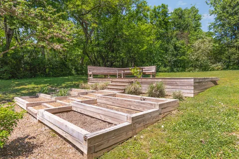 a view of a backyard with a small yard