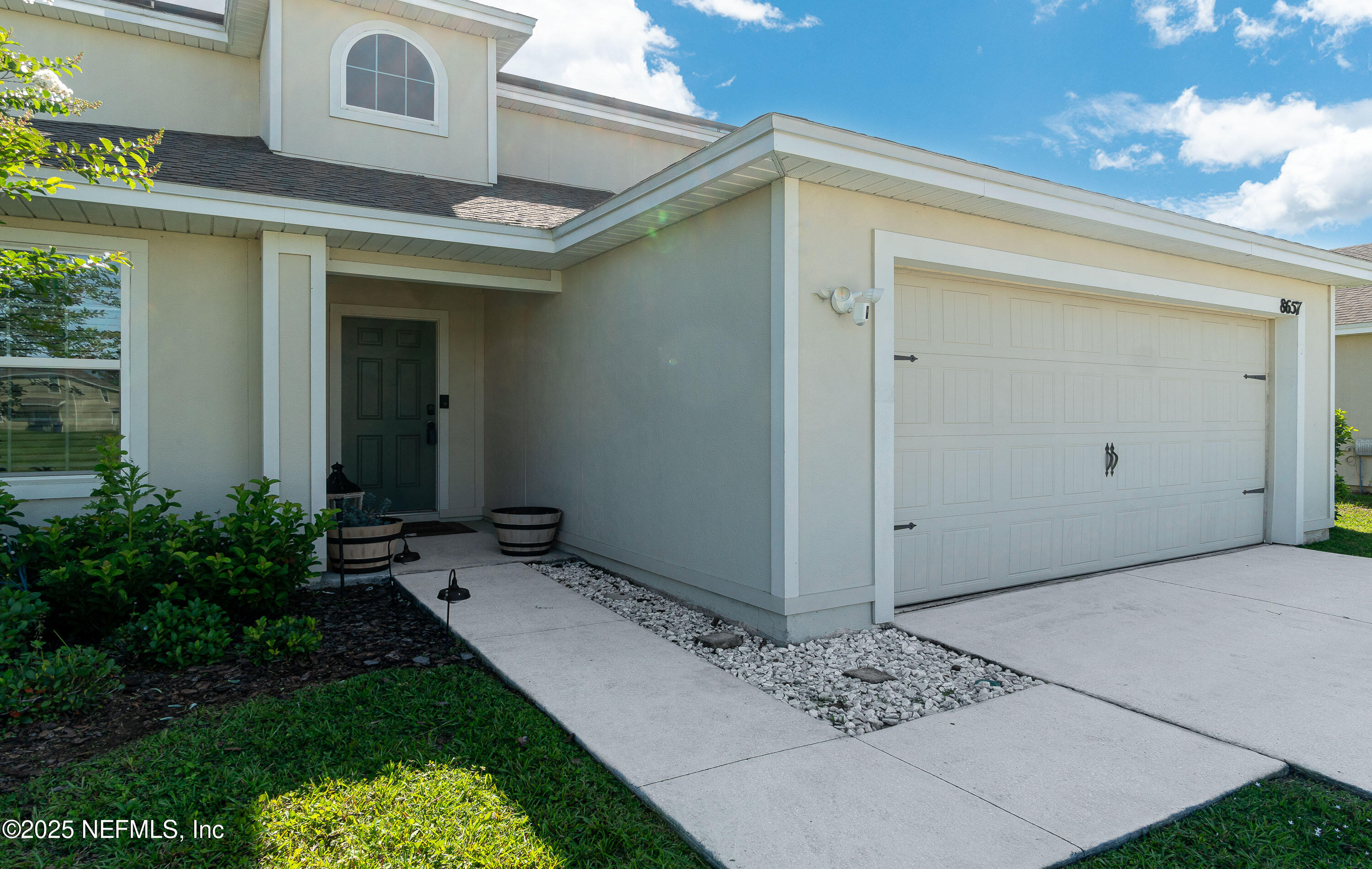 8657 Lake George Circle West Macclenny, FL 32063 - Photo 25 of 46 Ext Walkway