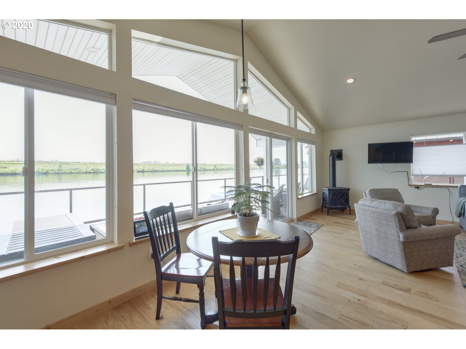 23586 Northwest St Helens Road, Unit U18 Portland, OR 97231 - Photo 12 of 30 a view of a dining room with furniture window and outside view