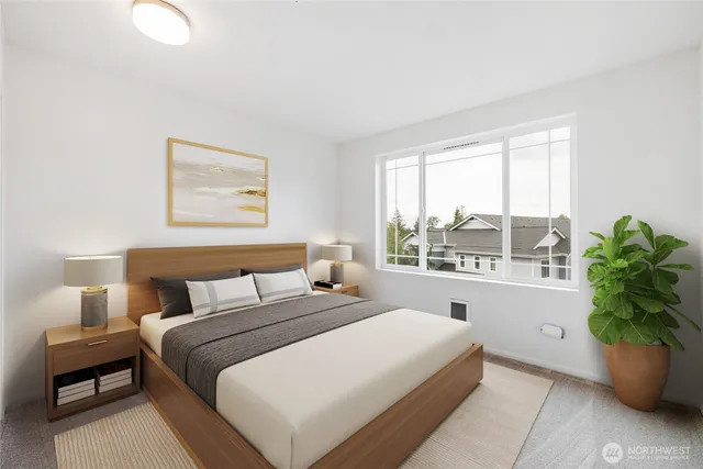 a bathroom with a granite countertop sink a toilet and a mirror