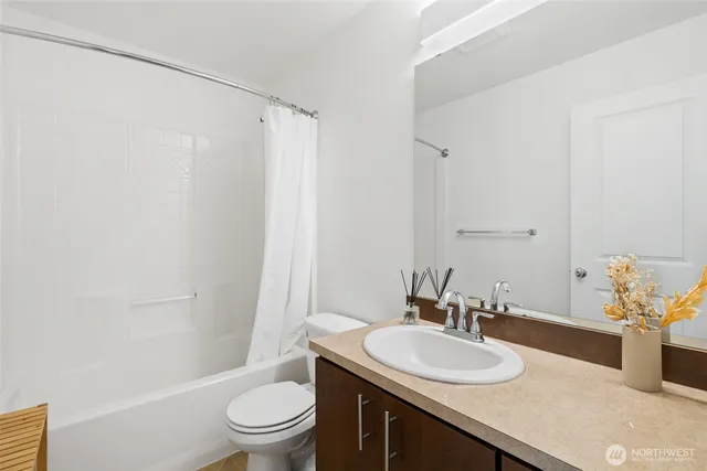 a view of a workspace with furniture