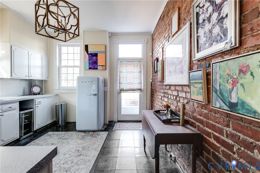 200 Strawberry Street Richmond, VA 23220 - Photo 14 of 36 Exposed brick on Kitchen wall
