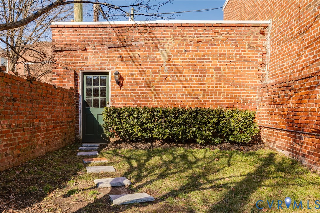 200 Strawberry Street Richmond, VA 23220 - Photo 35 of 36 enter the garage from the fenced yard