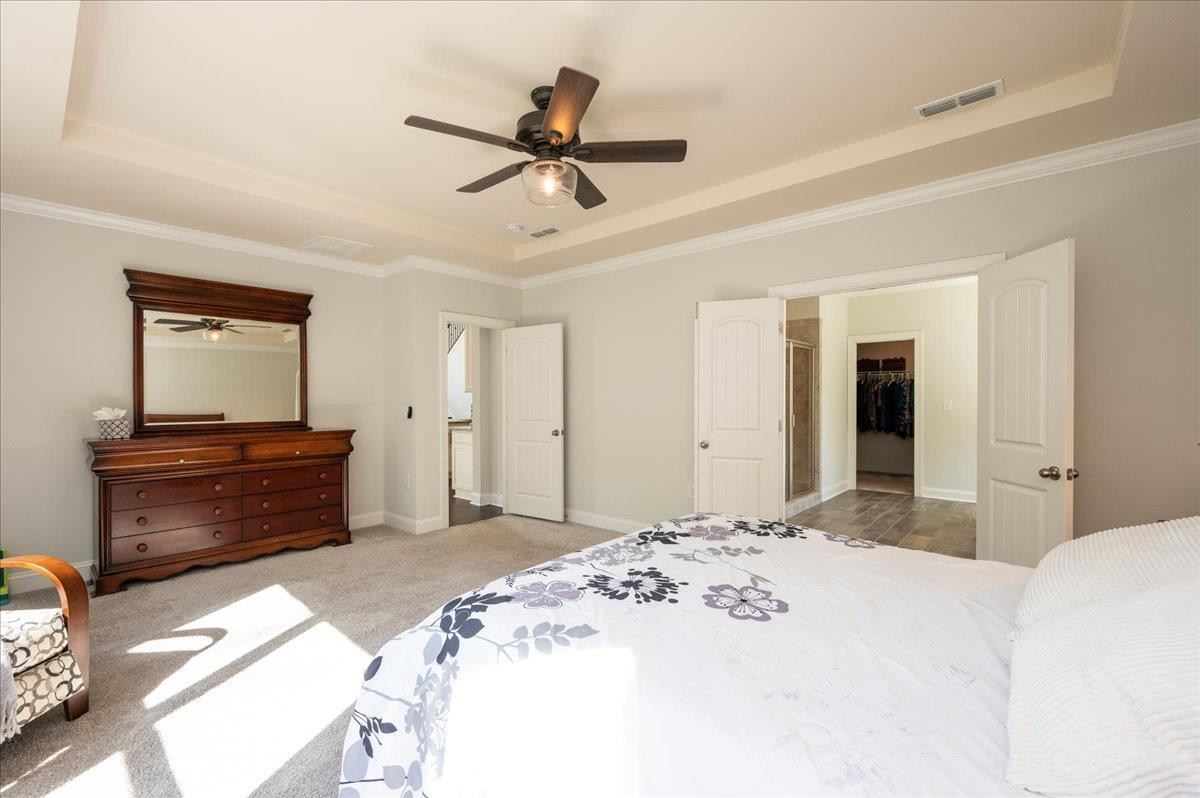 7108 Rex Road Holly Springs, NC 27540 - Photo 20 of 38 Primary bedroom