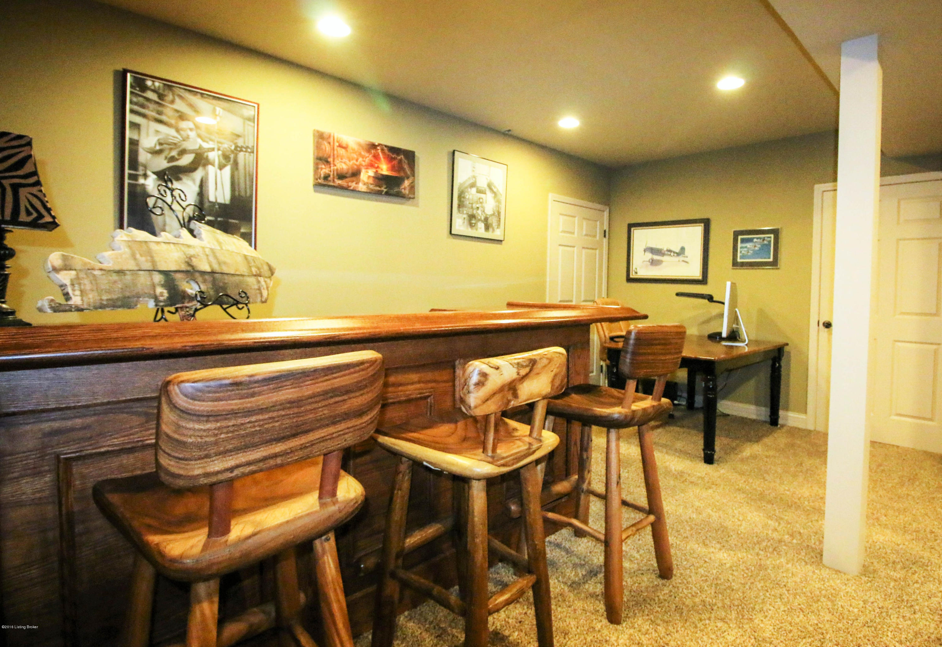 2904 Doe Ridge Court Prospect, KY 40059 - Photo 70 of 86 This space opens to a media room, which is wired for surround sound, and complete with a custom bar (sellers willing to leave with the property).