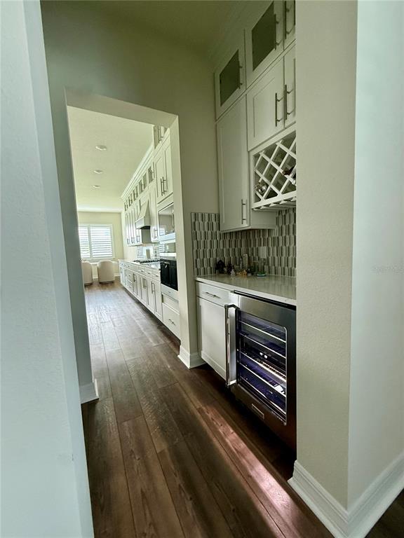 8441 Pk Clf Way Orlando, FL 32836 - Photo 12 of 59 a view of an entryway with wooden floor