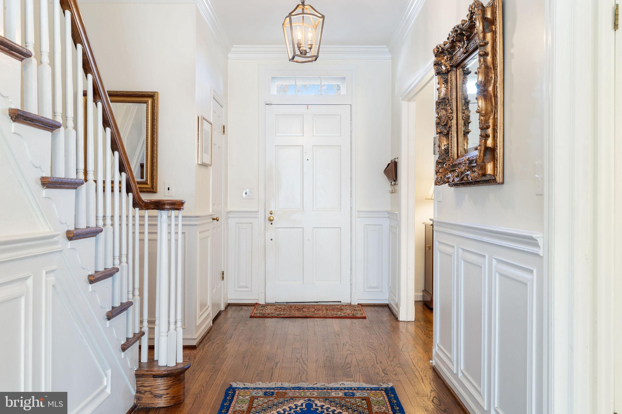 8007 Strauff Road, Unit 16 Towson, MD 21204 - Photo 2 of 49 a view of a hallway with wooden floor and entryway