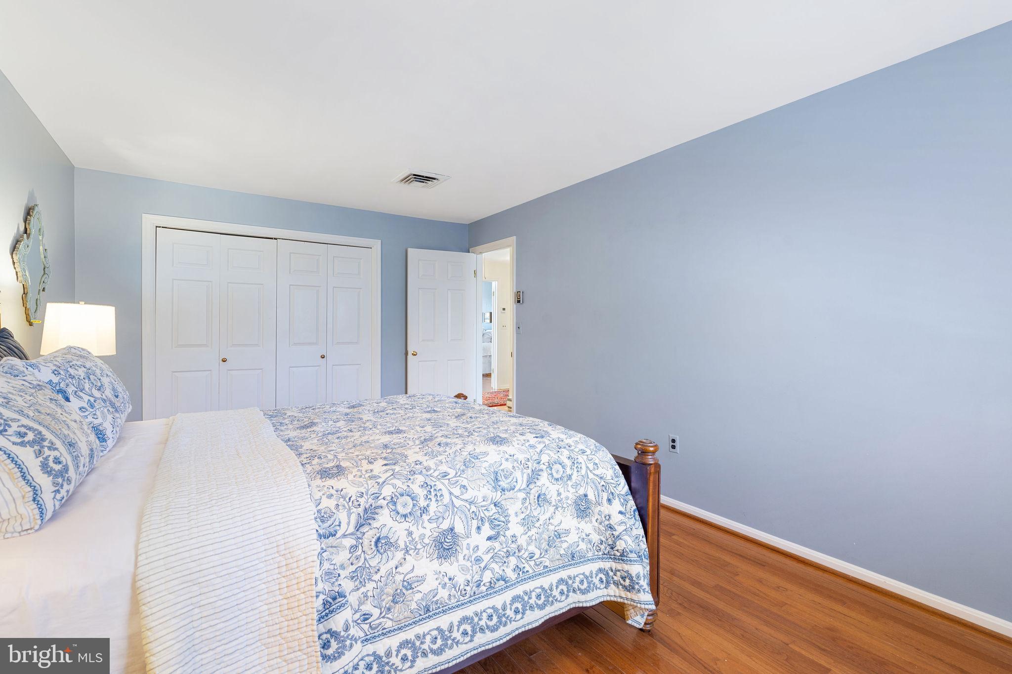 8007 Strauff Road, Unit 16 Towson, MD 21204 - Photo 30 of 49 a bedroom with a bed and a window