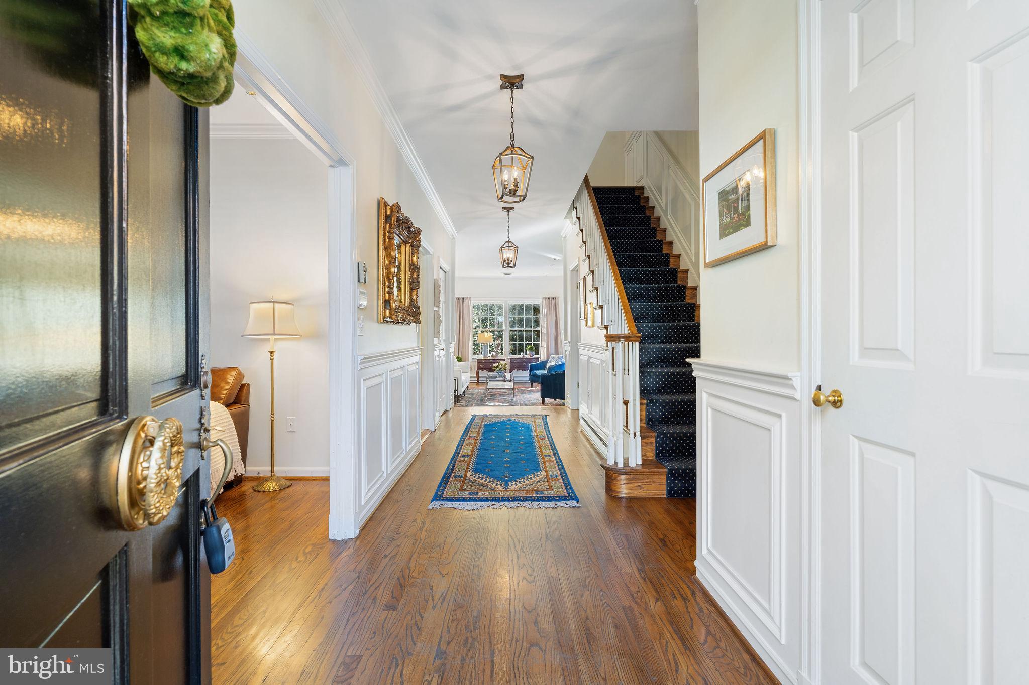 8007 Strauff Road, Unit 16 Towson, MD 21204 - Photo 3 of 49 a view of hallway with wooden floor