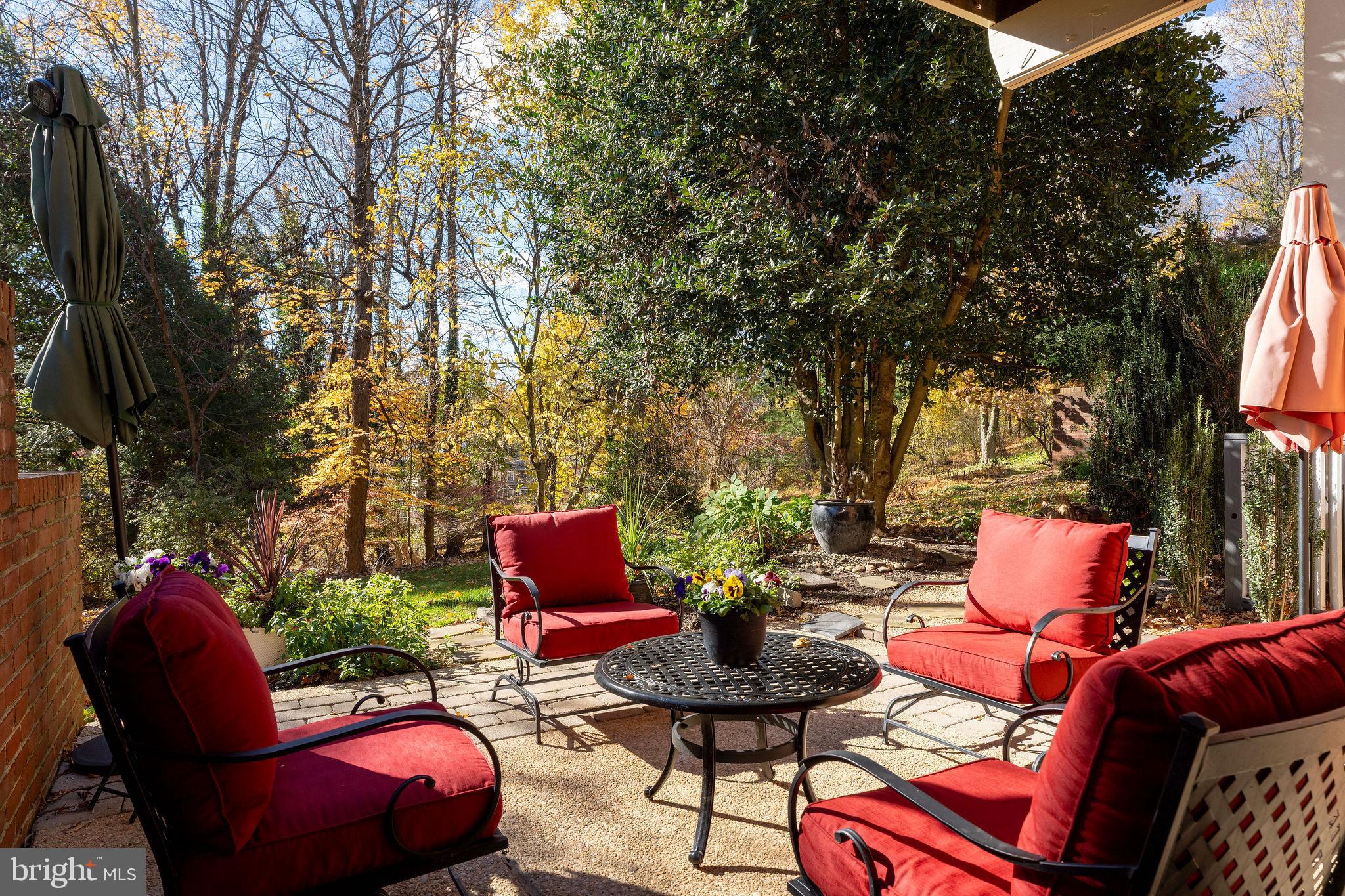 8007 Strauff Road, Unit 16 Towson, MD 21204 - Photo 38 of 49 a outdoor space with patio the couches and a potted plant on a table and chairs
