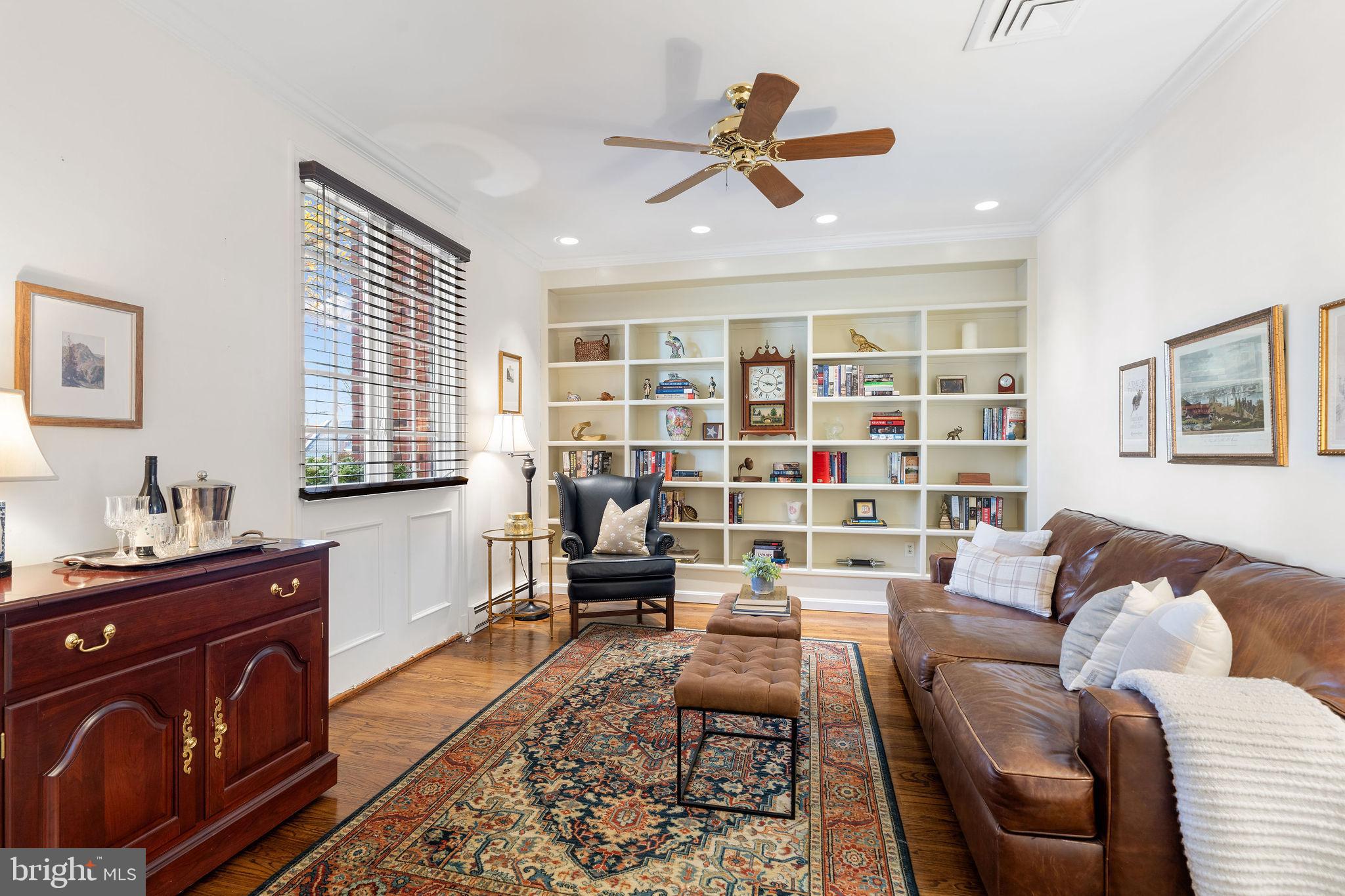 8007 Strauff Road, Unit 16 Towson, MD 21204 - Photo 4 of 49 a living room with furniture and a window