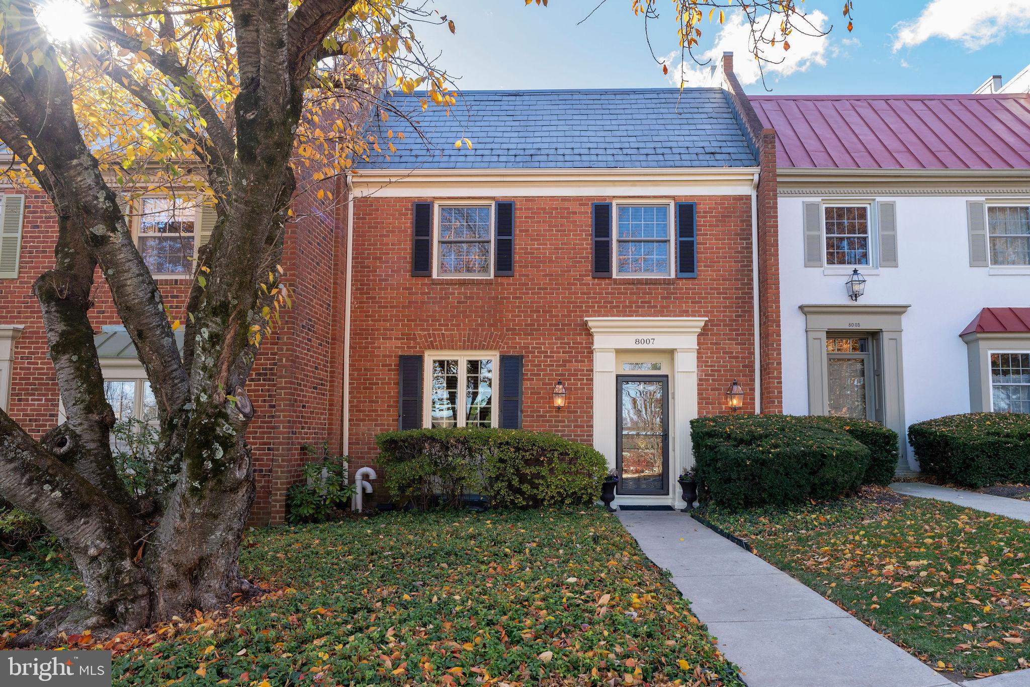 8007 Strauff Road, Unit 16 Towson, MD 21204 - Photo 44 of 49 a front view of a house with garden