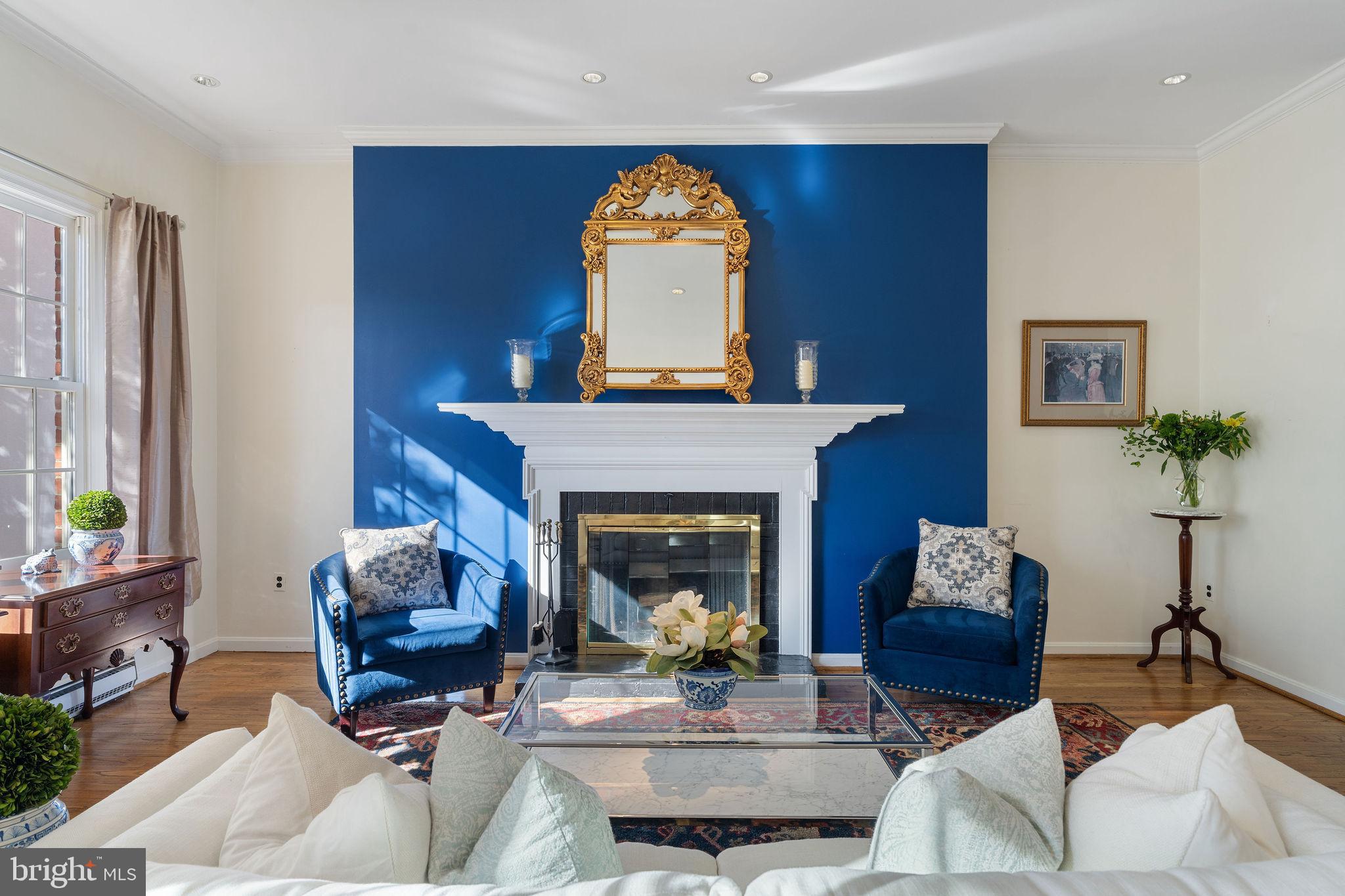 8007 Strauff Road, Unit 16 Towson, MD 21204 - Photo 10 of 49 a living room with furniture and a fireplace