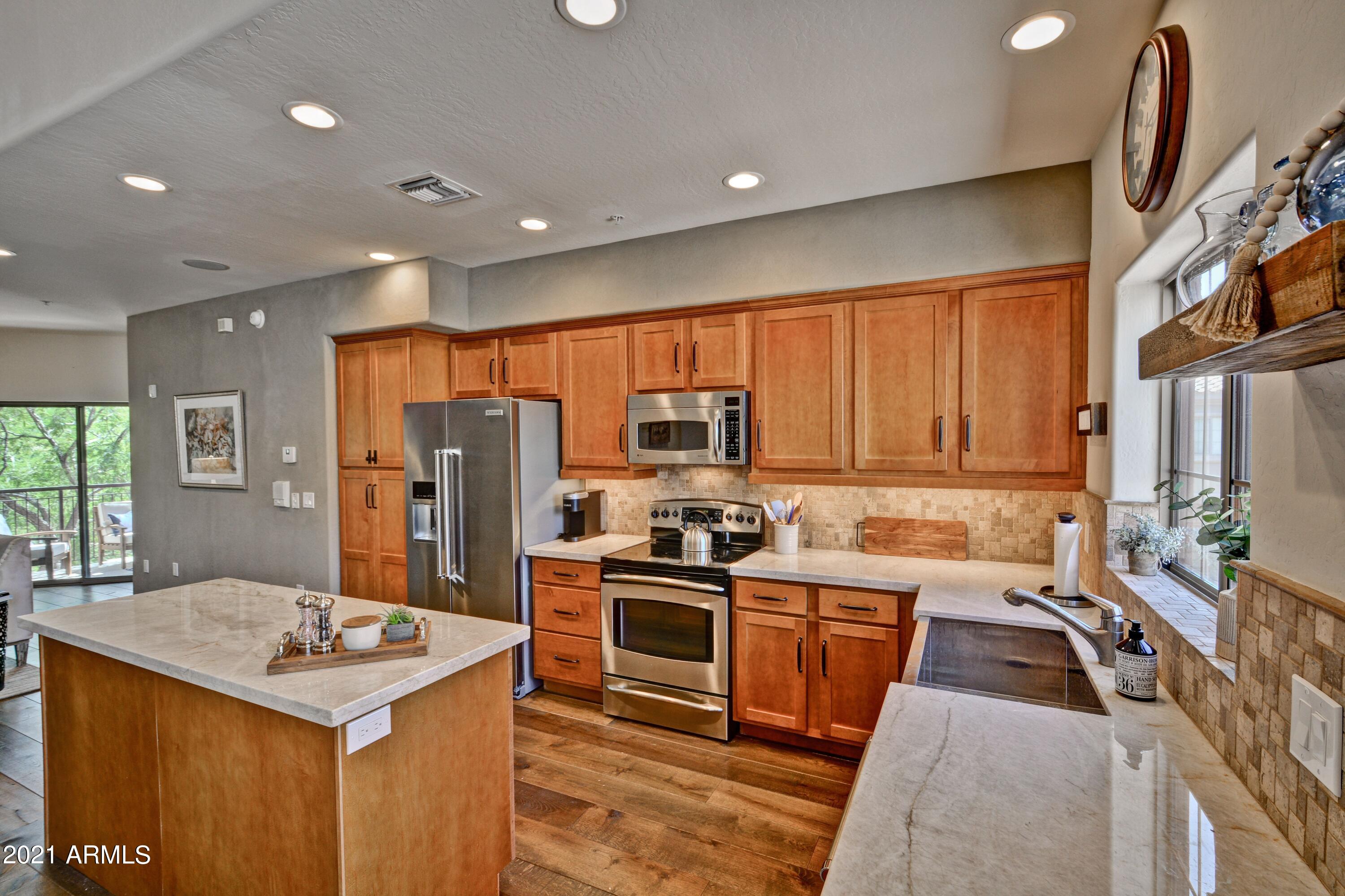 3935 East Rough Rider Road, Unit 1360 Phoenix, AZ 85050 - Photo 7 of 43 Kitchen