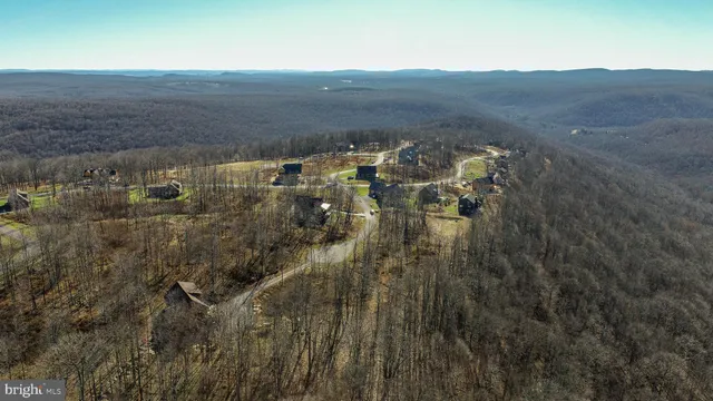 a view of residential houses with outdoor space