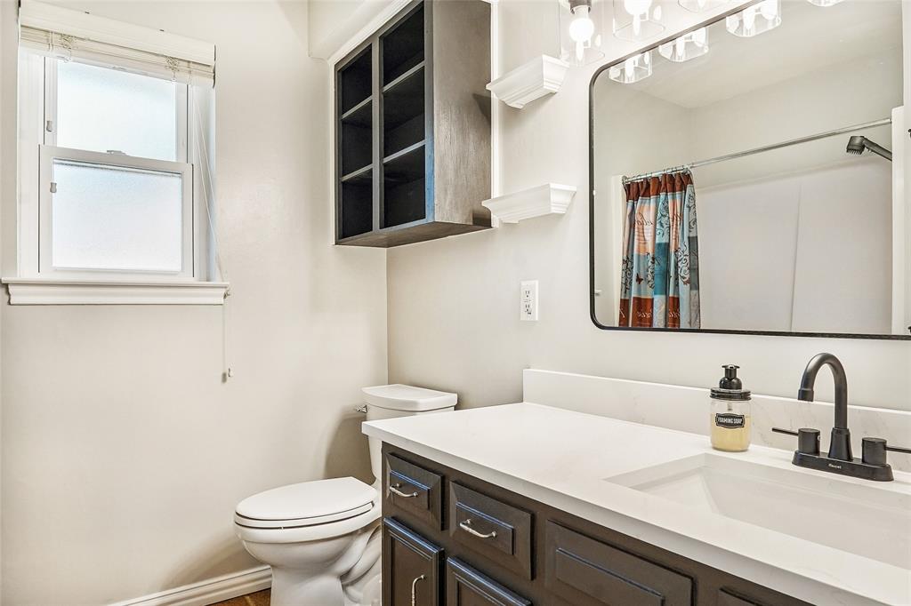 1506 Springbrook Street Corinth, TX 76210 - Photo 27 of 40 New cabinet, sink, toilet