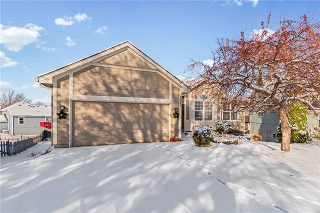 $360,000 | 1020 Northeast Woodbury Lane, Lee's Summit, MO 64086