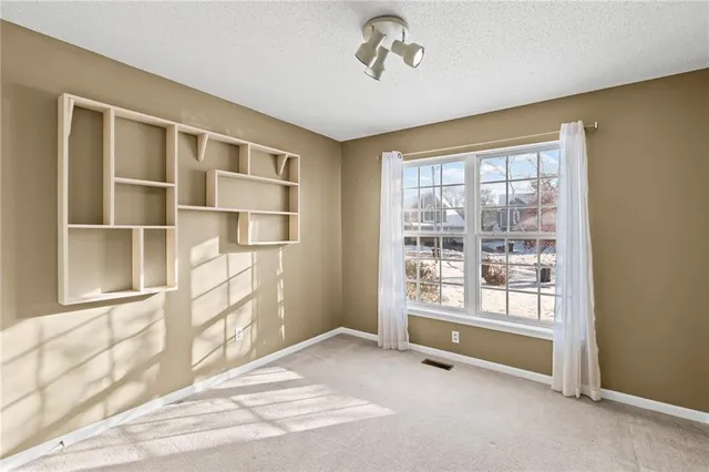 $360,000 | 1020 Northeast Woodbury Lane, Lee's Summit, MO 64086