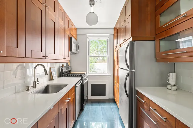 a living room with granite countertop furniture a dining table and kitchen view