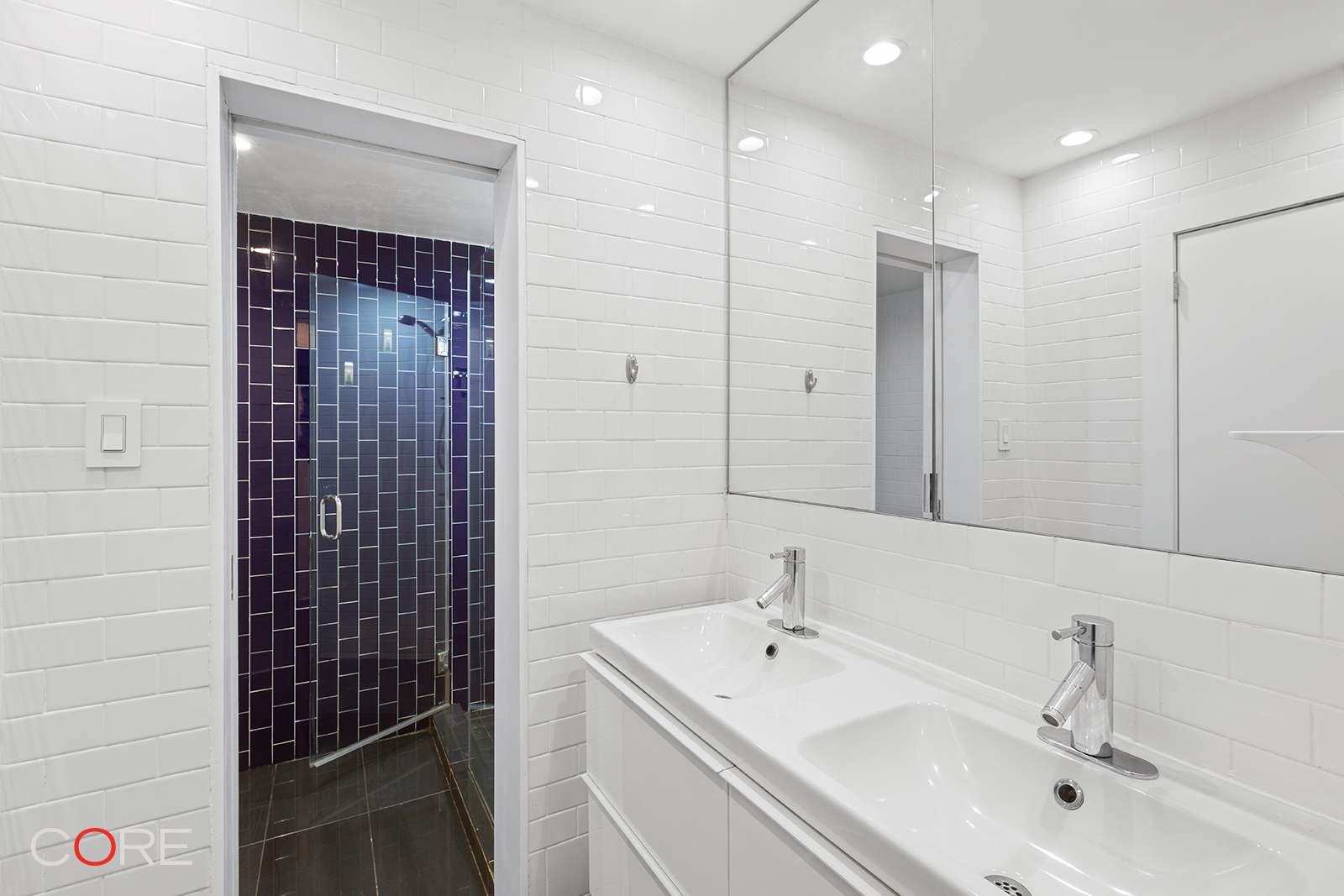 3725 Henry Hudson Parkway West, Unit 2F/2G Bronx, NY 10463 - Photo 7 of 10 a bathroom with a sink shower and a mirror