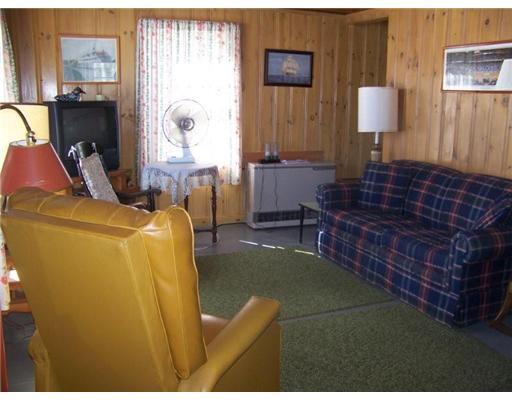 211 Trickey Pond Road Naples, ME 04055 - Photo 9 of 15 Living Room.