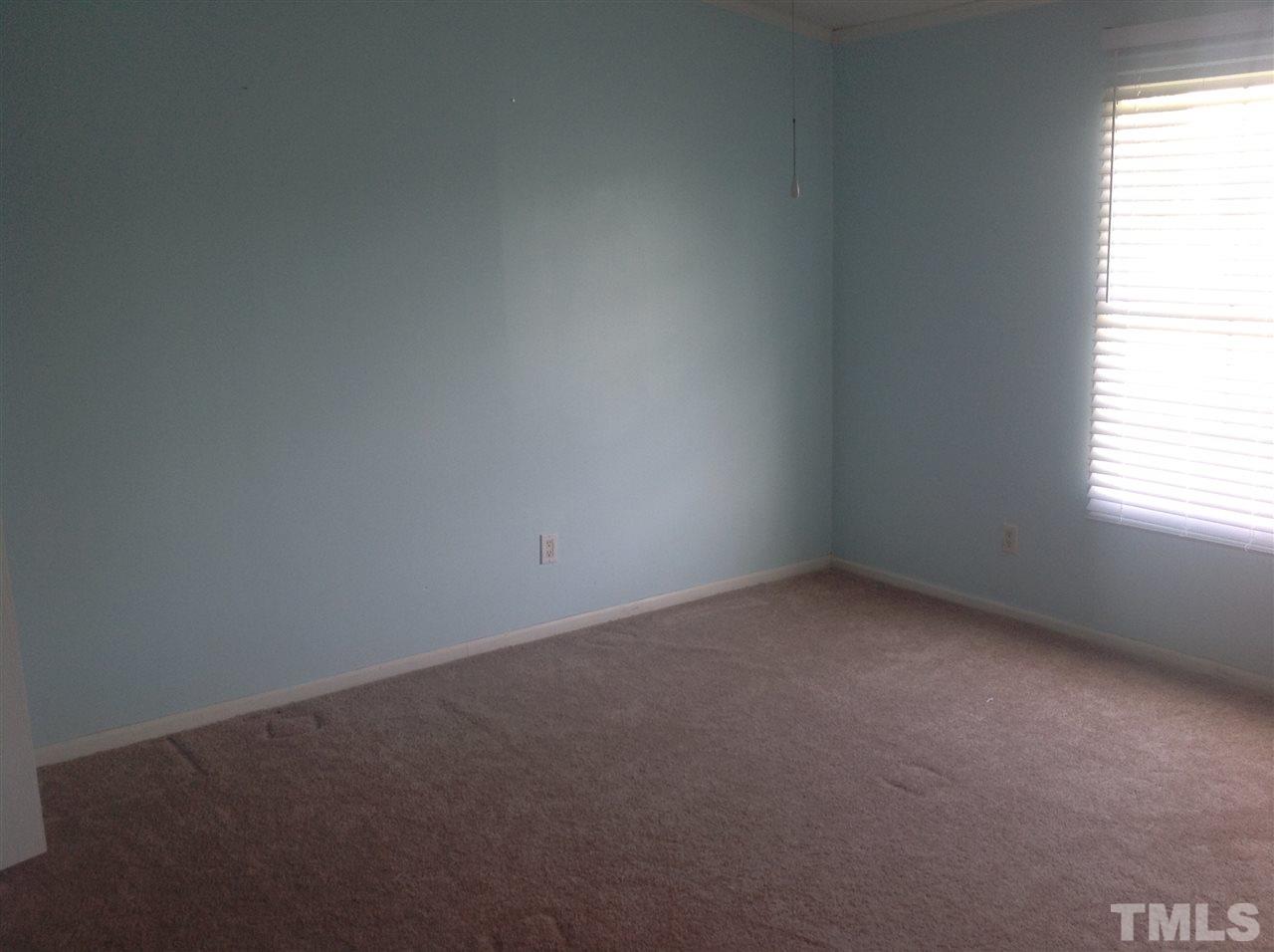 10958 Beaver Dam Road Middlesex, NC 27557 - Photo 22 of 24 an empty room with a window
