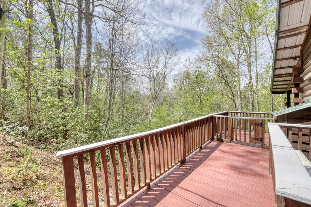 746 High Ridge Road Murphy, NC 28906 - Photo 12 of 44 a balcony with wooden floor and fence