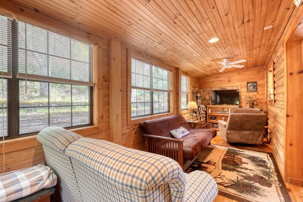 746 High Ridge Road Murphy, NC 28906 - Photo 23 of 44 a bedroom with furniture and large windows