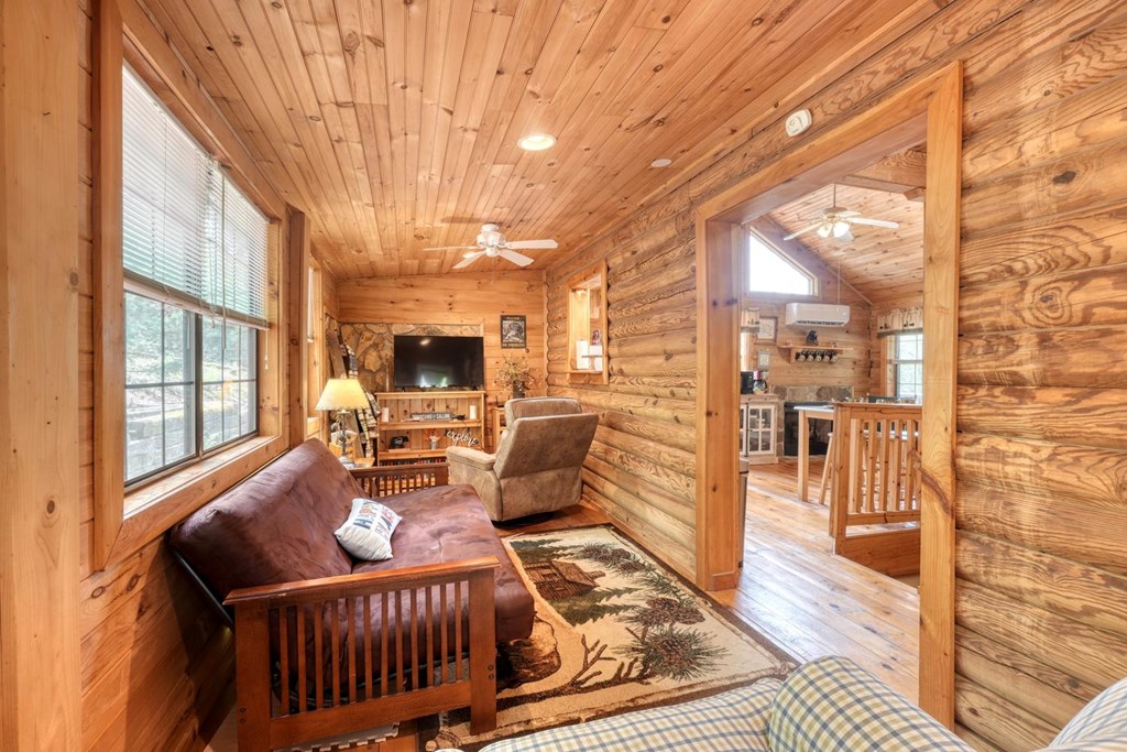 746 High Ridge Road Murphy, NC 28906 - Photo 24 of 44 a living room with furniture fireplace and flat screen tv