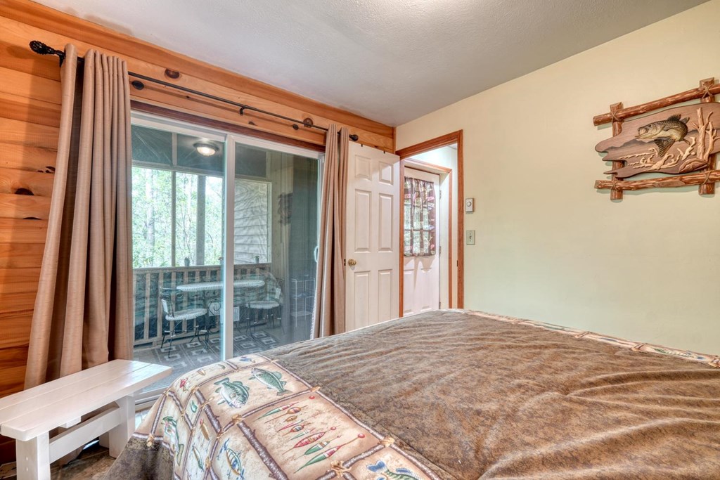 746 High Ridge Road Murphy, NC 28906 - Photo 34 of 44 a bedroom with a bed and a window