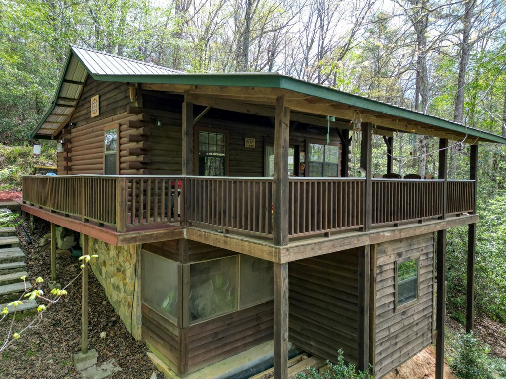 746 High Ridge Road Murphy, NC 28906 - Photo 7 of 44 a view of wooden house with a small yard