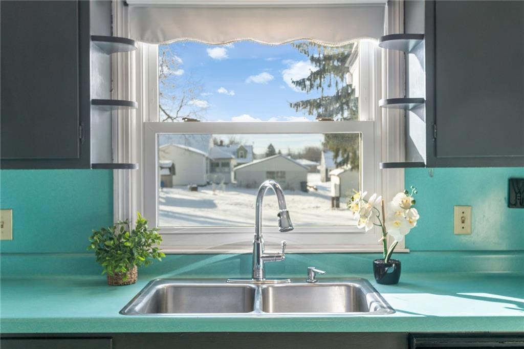 738 Addis Street New Castle, PA 16101 - Photo 16 of 50 a kitchen with a refrigerator and a sink