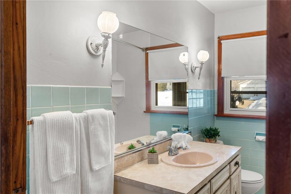 738 Addis Street New Castle, PA 16101 - Photo 24 of 50 a bathroom with a sink vanity and a mirror