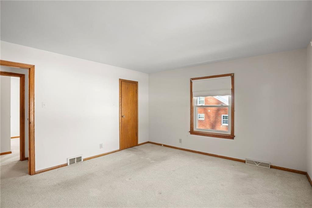 738 Addis Street New Castle, PA 16101 - Photo 29 of 50 an empty room with windows