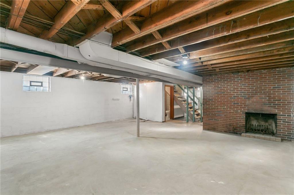 738 Addis Street New Castle, PA 16101 - Photo 37 of 50 a view of an empty room with a fireplace
