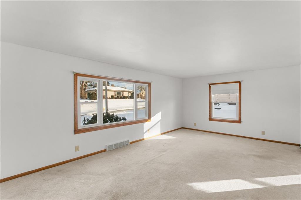 738 Addis Street New Castle, PA 16101 - Photo 5 of 50 an empty room with windows