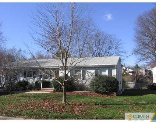 43 Clemson Road Old Bridge, NJ 08859 - Photo 1 of 2 a front view of a house with a yard