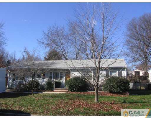 43 Clemson Road Old Bridge, NJ 08859 - Photo 2 of 2 front view of a house with a yard