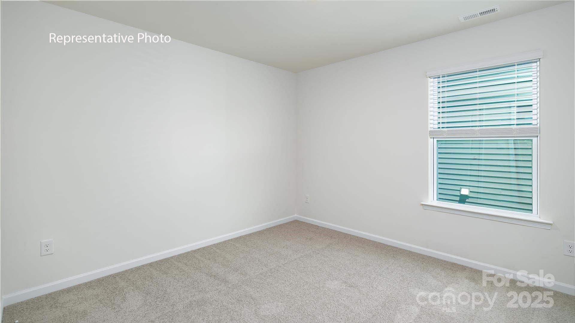 2668 Goose Fair Road Maiden, NC 28650 - Photo 20 of 28 an empty room with a window