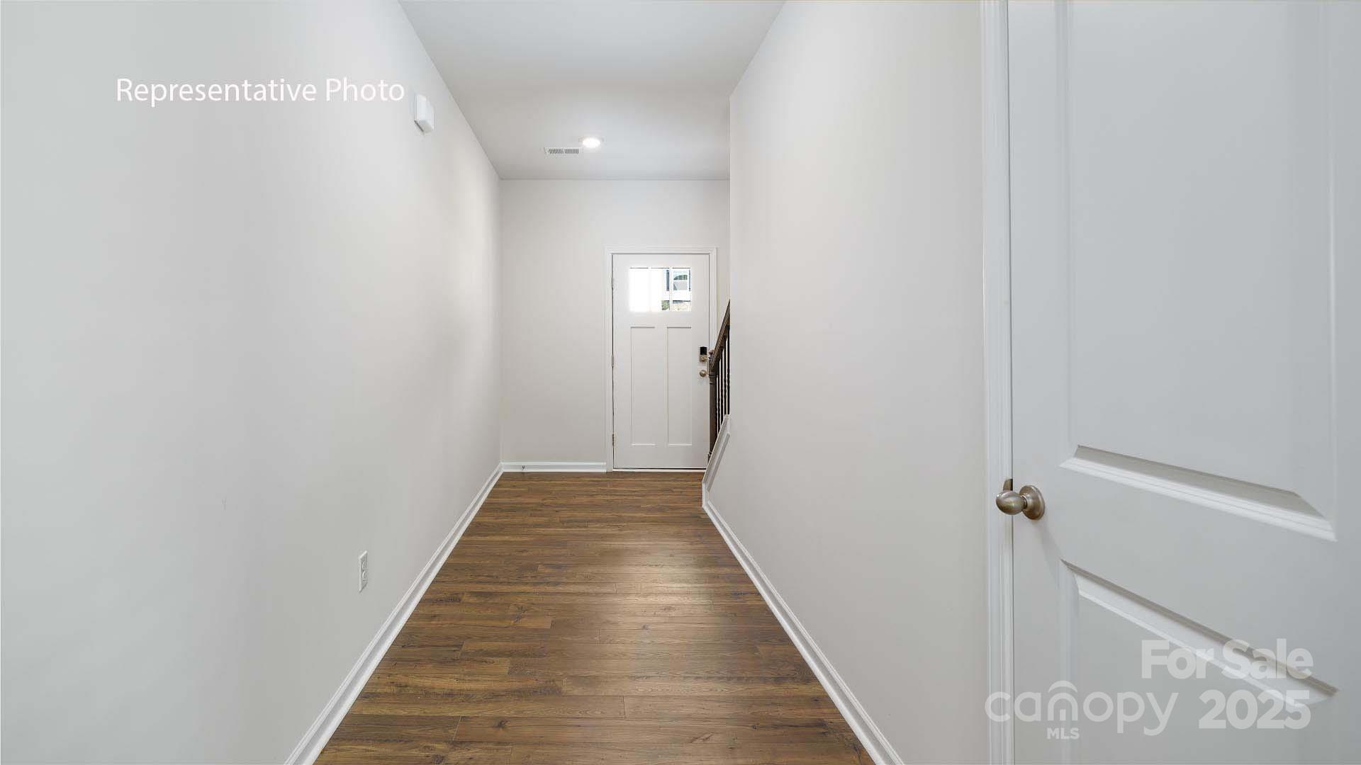 2668 Goose Fair Road Maiden, NC 28650 - Photo 2 of 28 a view of a hallway with wooden floor