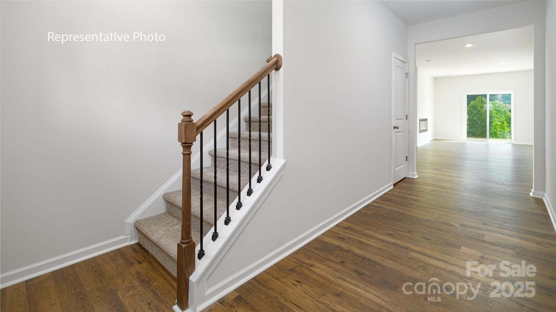 2668 Goose Fair Road Maiden, NC 28650 - Photo 3 of 28 a view of a hallway with wooden floor and entryway