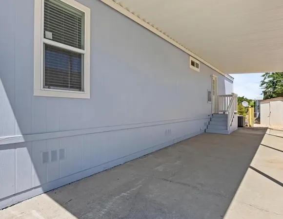 a view of a house with a street