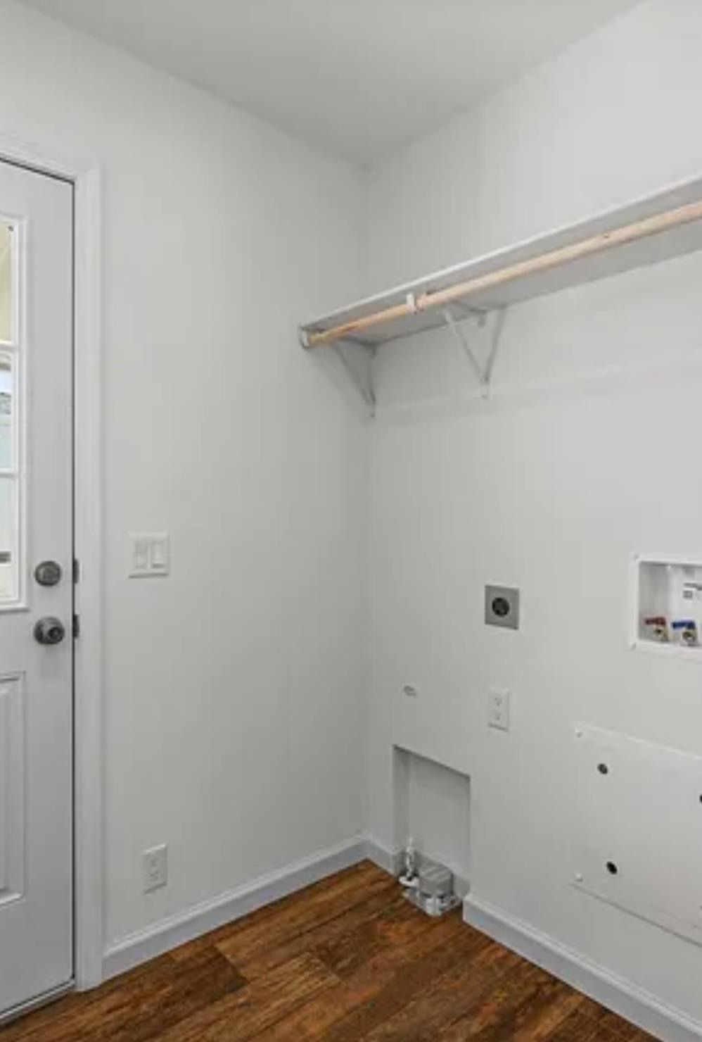 2240 Golden Oak Lane, Unit 104 Merced, CA 95341 - Photo 7 of 19 a room with a walk in closet and wooden floor