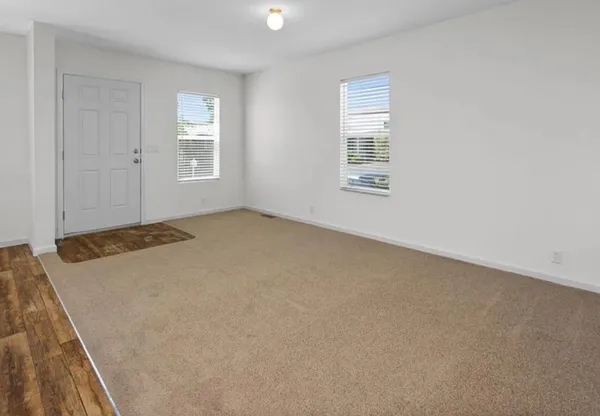 an empty room with windows