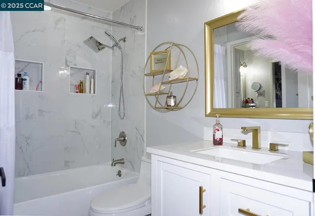 a bathroom with a sink a toilet and a bathtub